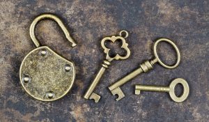 keys and padlock used in escape room theme