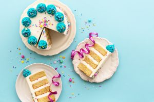 image of birthday cake with slices, part of the birthday party checklist items